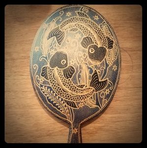 Beautiful vintage Pisces hand held mirror.